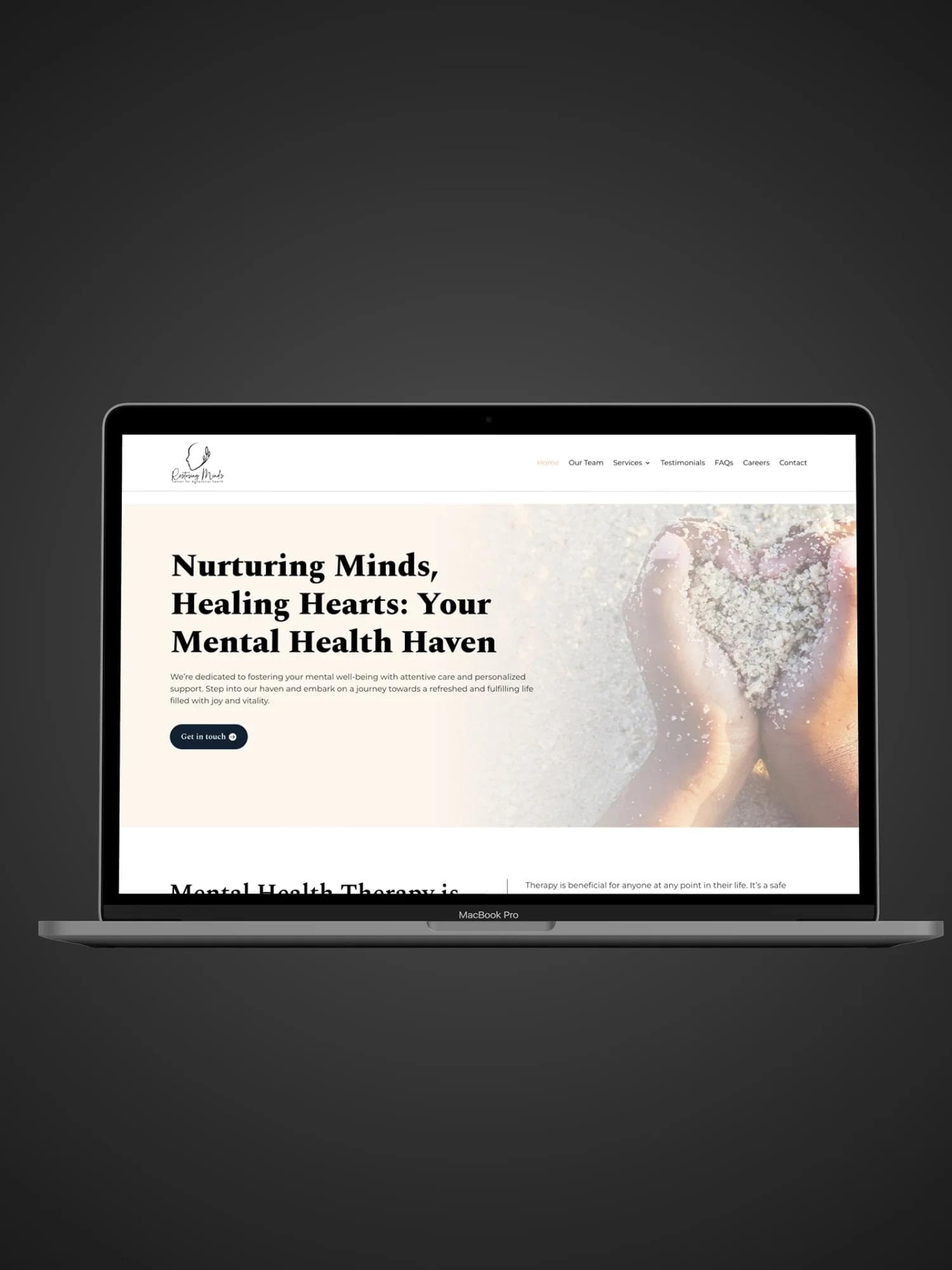 Restoring Minds Center for Behavioral Health website on a laptop.