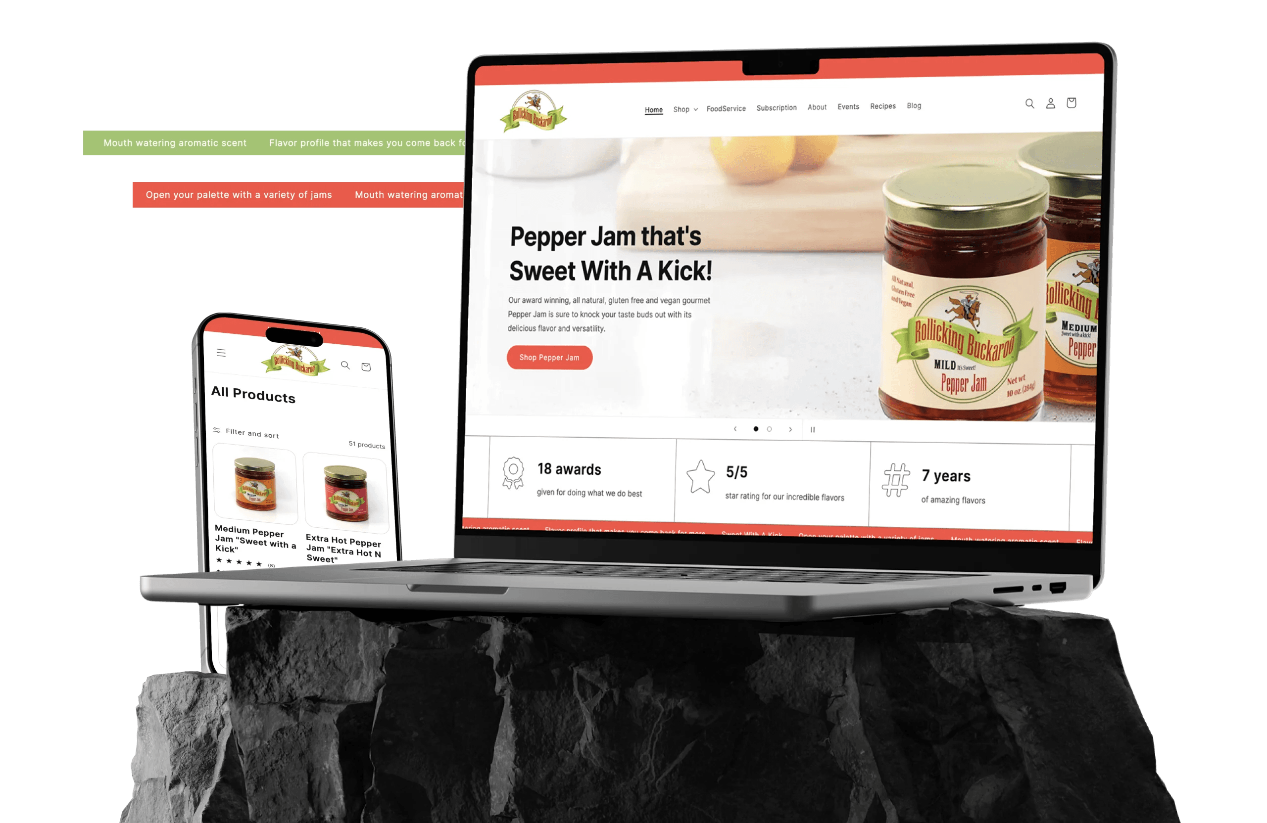 Rollicking Buckaroo Pepper Jam and Seasoning Blends and their website UI design elements on a phone and laptop sitting on top of stone blocks.